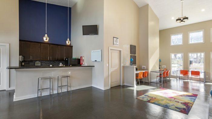the living room and kitchen area at The The Breck