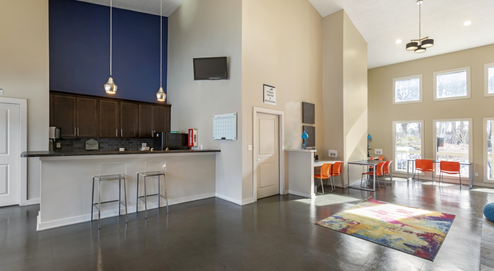 the living room and kitchen area at The The Breck